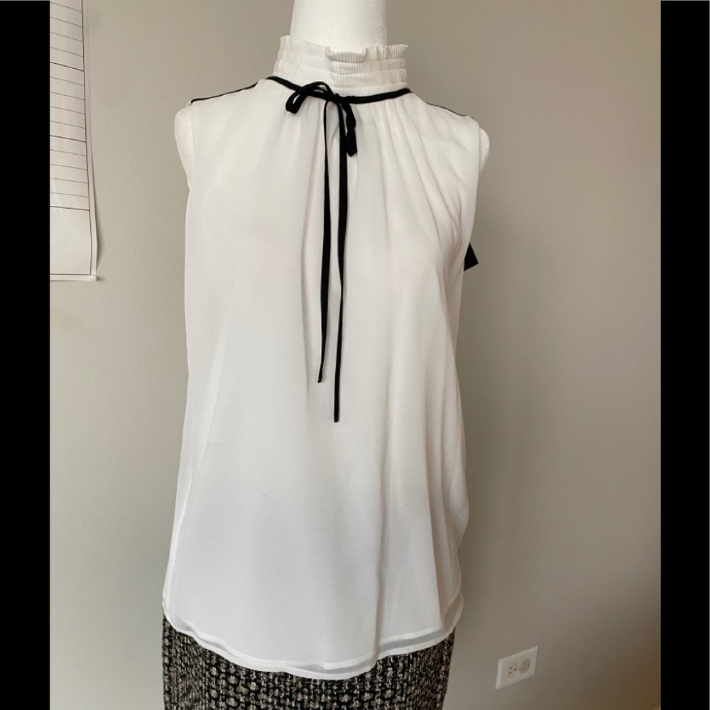 sleeveless white top